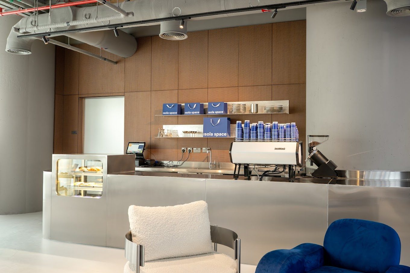 Isola Spaces — Bespoke Stainless Steel Counter & Display System gallery image 3