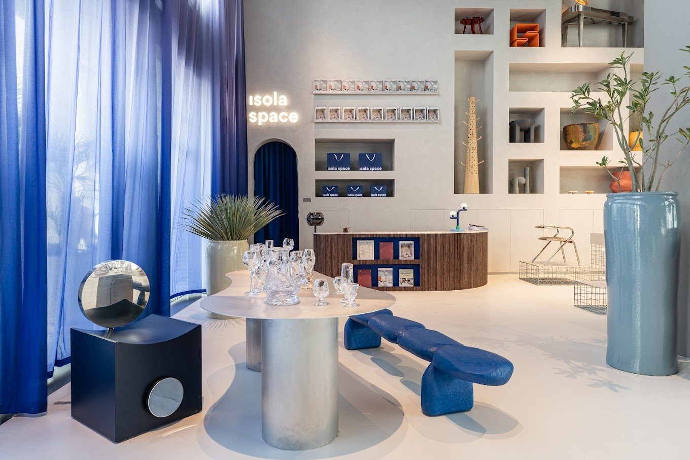 Isola Spaces — Bespoke Stainless Steel Counter & Display System gallery image 1